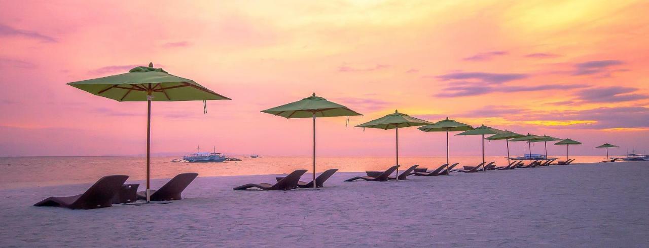 Oceanica Resort Panglao, Bohol מראה חיצוני תמונה Sunset at the beach